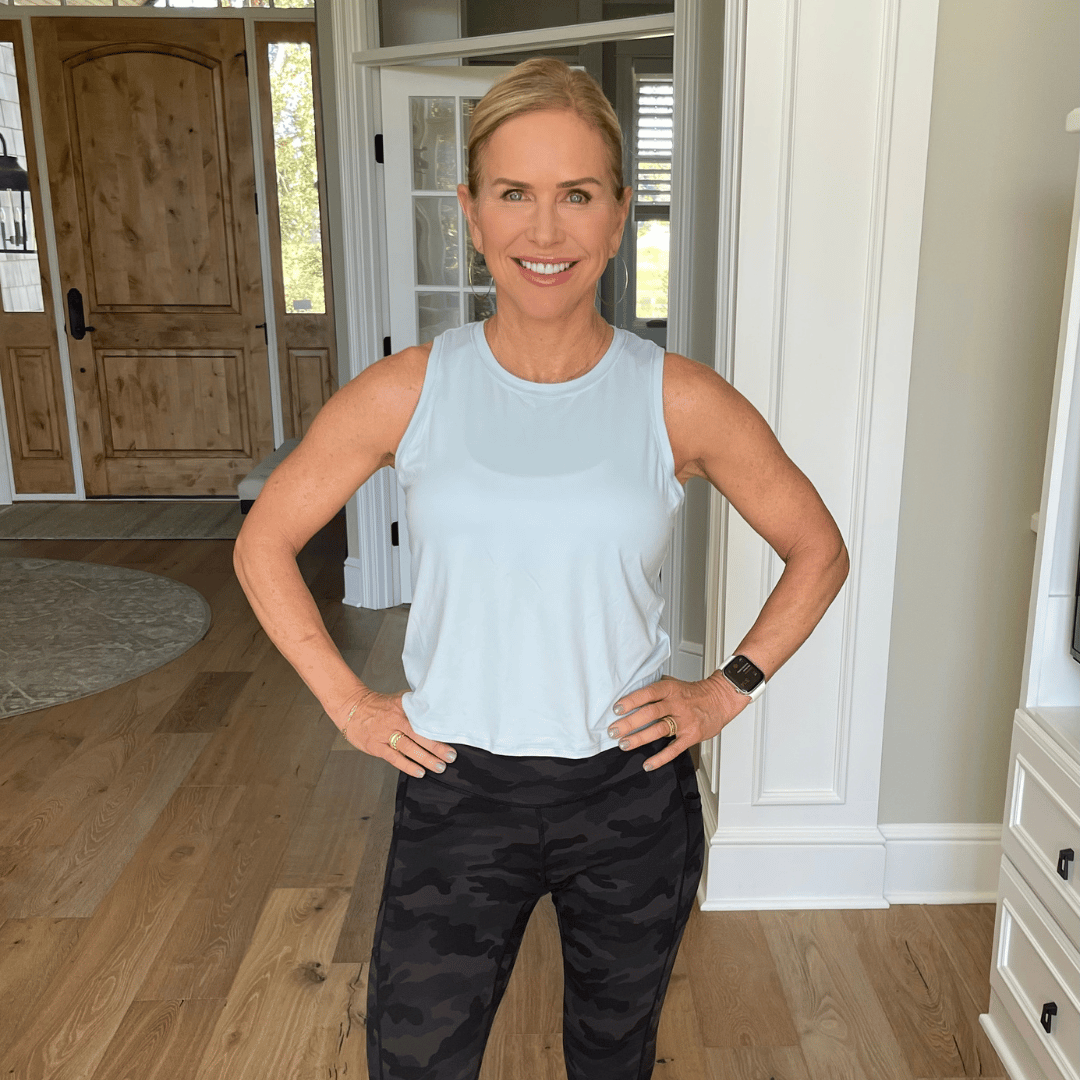 Blue athletic tank top with camo black leggings